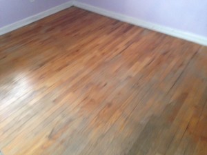 Solid Red Oak wood floor in San Marco, Jacksonville, Florida home, before refinishing