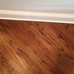 Close up of edge work on finished hardwood floors