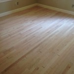 Light sanding prepares hardwood floors for stain and finish