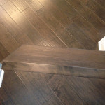 Solid Oak stair treads refinished to match Maple wood flooring color