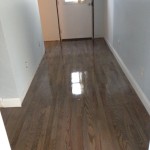 Classic Gray stained solid Red Oak wood flooring coated with polyurethane satin finish