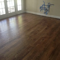 Refinished (sanded and stained) solid Red Oak wood floor
