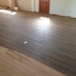 Sanding wood floor; staining preparation