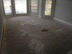 Bare subfloor ready for clean-up and wood flooring installation