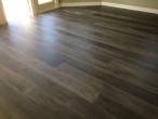 Blackish-gray, wire brushed White Oak flooring