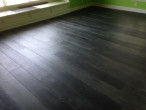 Blackish-gray, wire brushed White Oak flooring