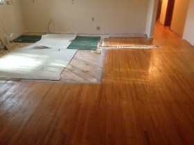 exposed sub-floor prior to weave-in wood floor repair