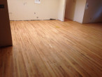 Neutral Duraseal stain applied to the sanded Red Oak floor