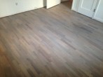 Stained and refinished Red Oak floor for the beach house look