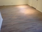 Stained and refinished Red Oak floor for beach house look