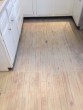 Stained and refinished Yellow Pine Kitchen floor for a beach house look