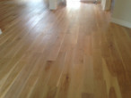 Wire brushed engineered White Oak wood flooring installed