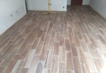 Faux wood floor tiles installed