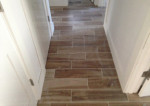 Wood look floor tile installed in hallway