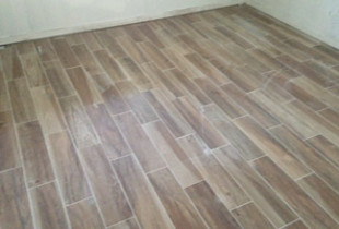 Wood look floor tiles installed