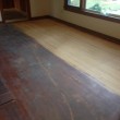 Beauty of old solid Heart Pine wood flooring shows up during sanding process