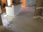 Concrete slab subfloor prior to leveling and wood floor installation