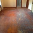 Old Heart Pine wood flooring prior to refinishing