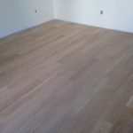 5 inch wide solid White Oak plank flooring installed