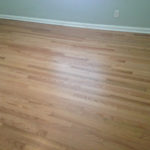 Old solid Red Oak wood floor after repair & refinishing