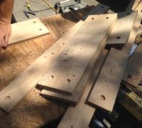 Boring holes for walnut plugs in white oak planks