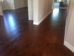 Installed - new engineered hand scraped birch wood flooring