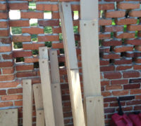 Random width white oak planks, bored for walnut plugs