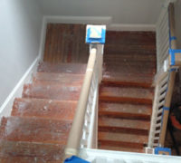 Old wood stairs in a historic Springfield home before refinishing