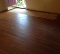 Area of sanded old Red Oak wood flooring, near the door