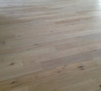 Engineered white stained White Oak wood flooring for a beach house look