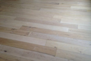 Engineered white stained White Oak wood flooring for a beach house look