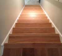 Finished and installed solid White Oak stair treads