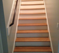 Finished and installed solid White Oak stair treads