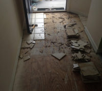 Removing the hallway floor tiles