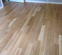 Sanded and finished White Oak wood flooring