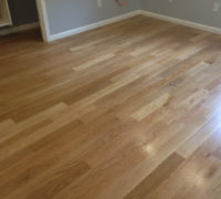 Sanded and finished White Oak wood flooring