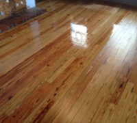 Sanded solid Heart Pine wood floor during refinishing