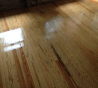 Sanded solid Heart Pine wood floor during refinishing