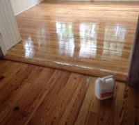 Sanded solid Heart Pine wood floor during refinishing