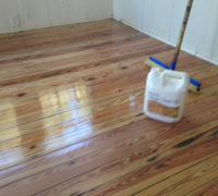 Sanded solid Heart Pine wood floor during refinishing