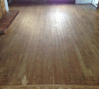 Solid Heart Pine wood floor before refinishing