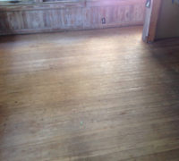 Solid Heart Pine wood floor before refinishing