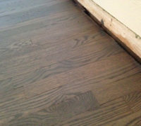 Stained and refinished old solid Red Oak wood flooring for a "Beachy Look"