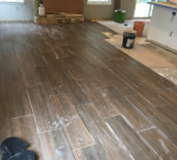 Wood look floor tile installation