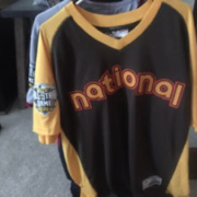 Baseball jersey with "national" text design.