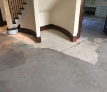 Leveled concrete slab subfloor