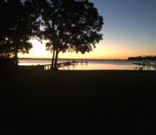 Sunset view of the pier behind client's home on the St. Johns River