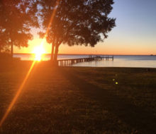 Sunset view of the pier behind client's home on the St. Johns River - Avondale