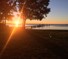 Sunset view of the pier behind client's home on the St. Johns River - Avondale