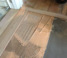 Aligning and installing new Red Oak planks with existing